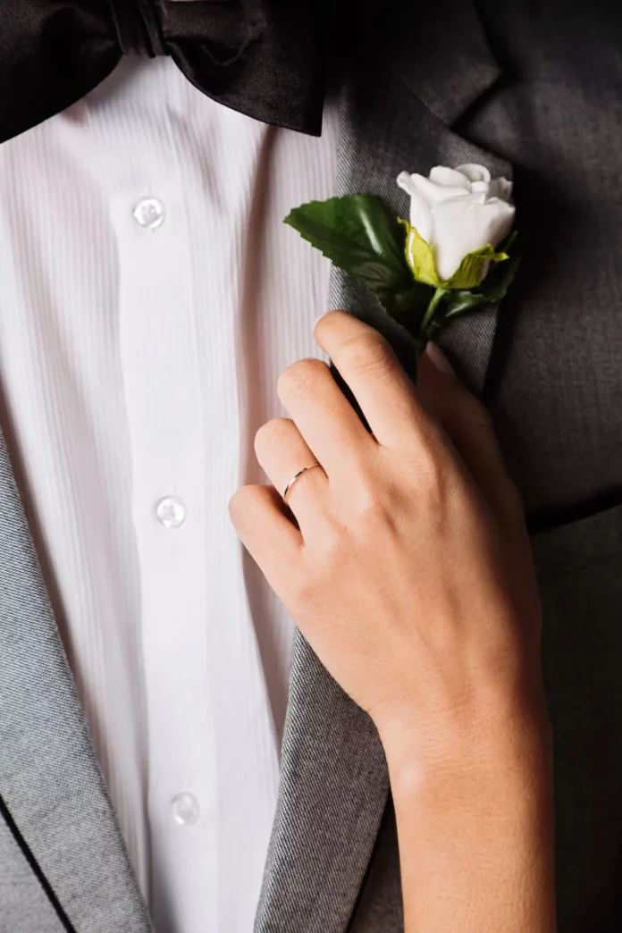 Boutonnieres On Tuxedo - Wedding Affair